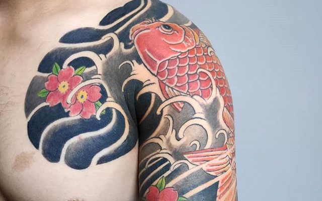 Tatuagem oriental de dragão realizada na NT Tattoo